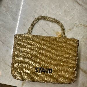 Staud gold evening bag